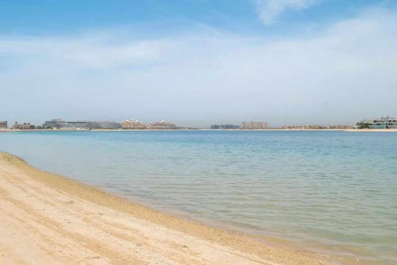 Spacious 2-Bedroom Beachfront Apartment With Pool Дубай