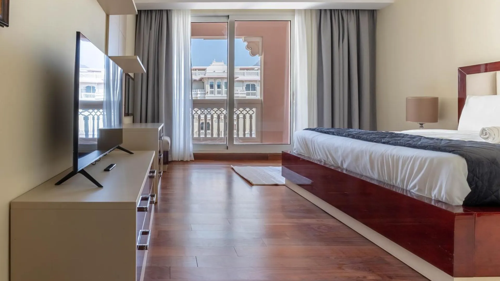 Spacious 2-Bedroom Beachfront Apartment With Pool Дубай